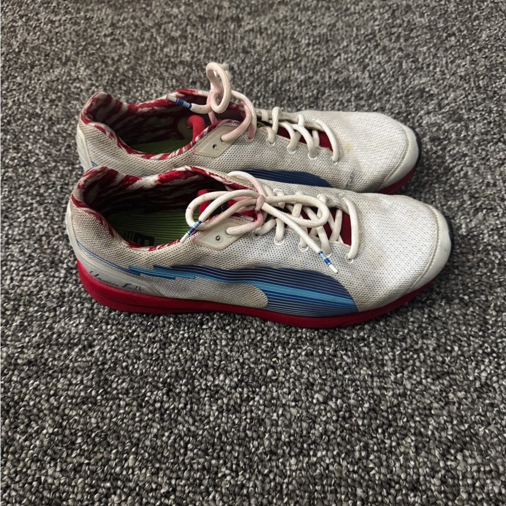 Usain Bolt limited edition Puma White and Blue Sneakers with Red Sole